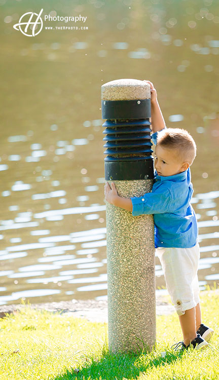 child-playing-near-water