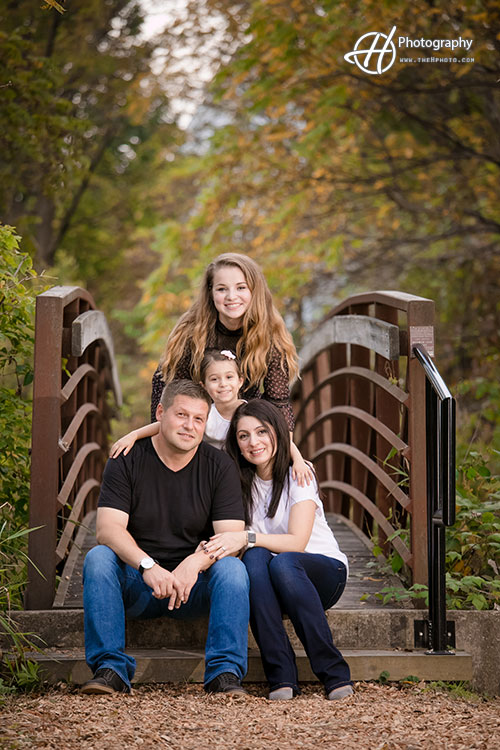family photo by the bridge in Long Grove