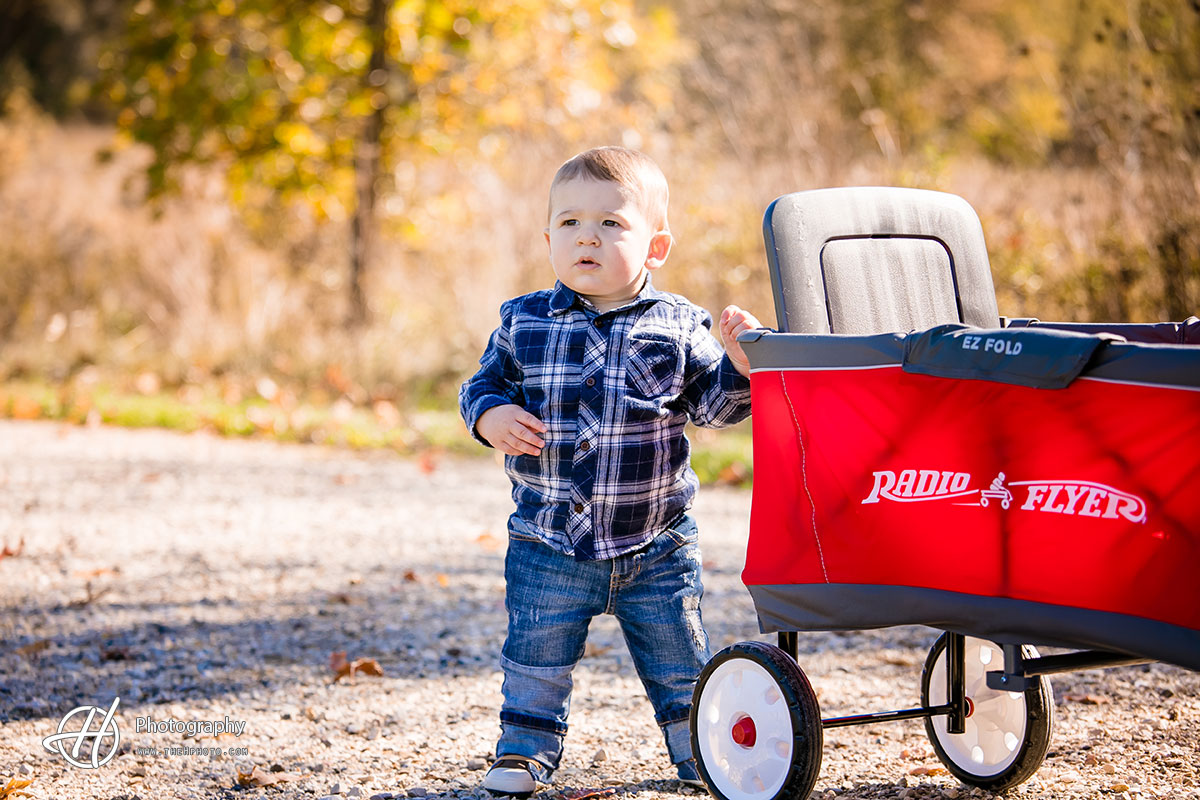 baby Easton by the wagon 