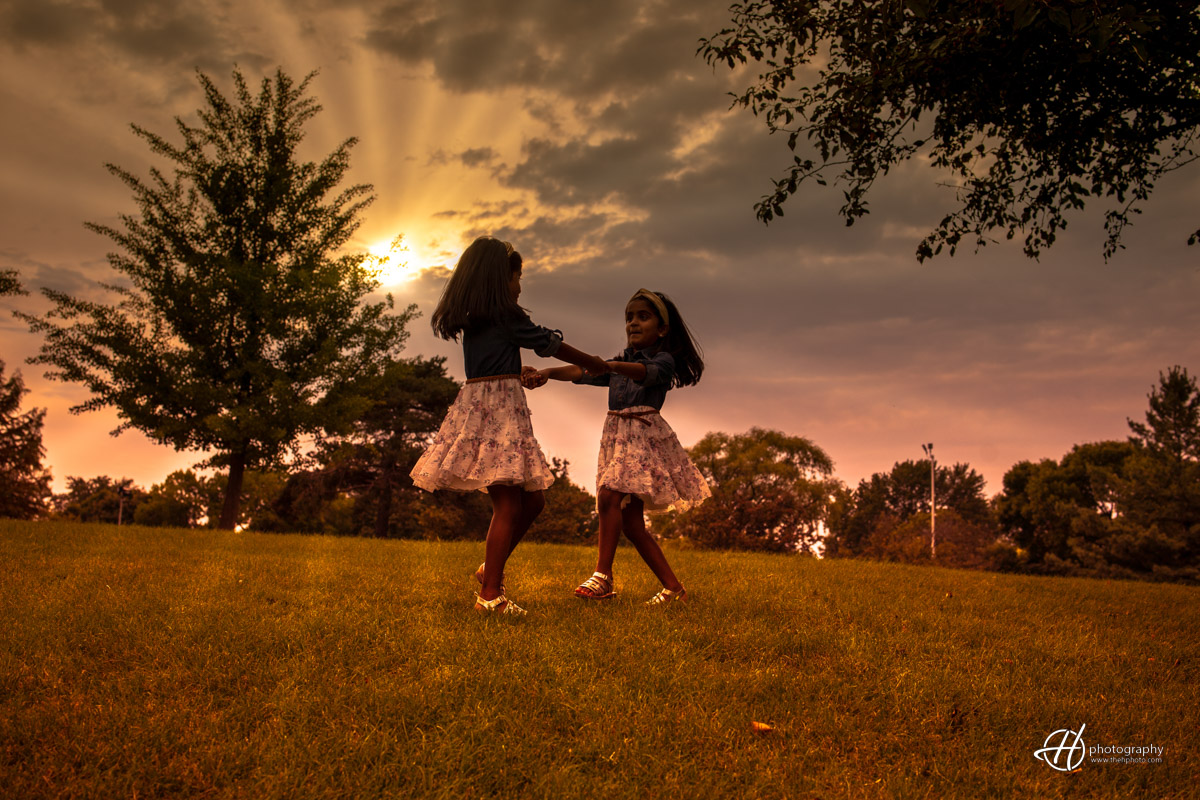 the girls dancing in sunset