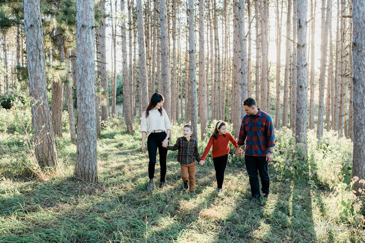 Vesa family walking around the Veteran Acres forest preserve 