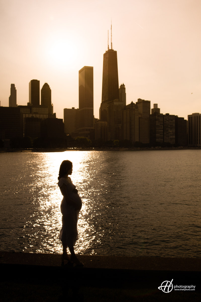 Lisa's silhouette against sunset against Chicago Skyline 