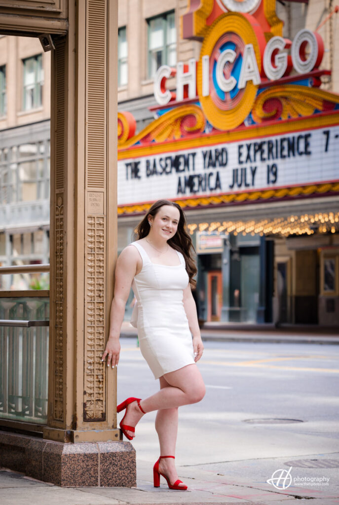 Amelia posing by the Iconic Chicago Theater