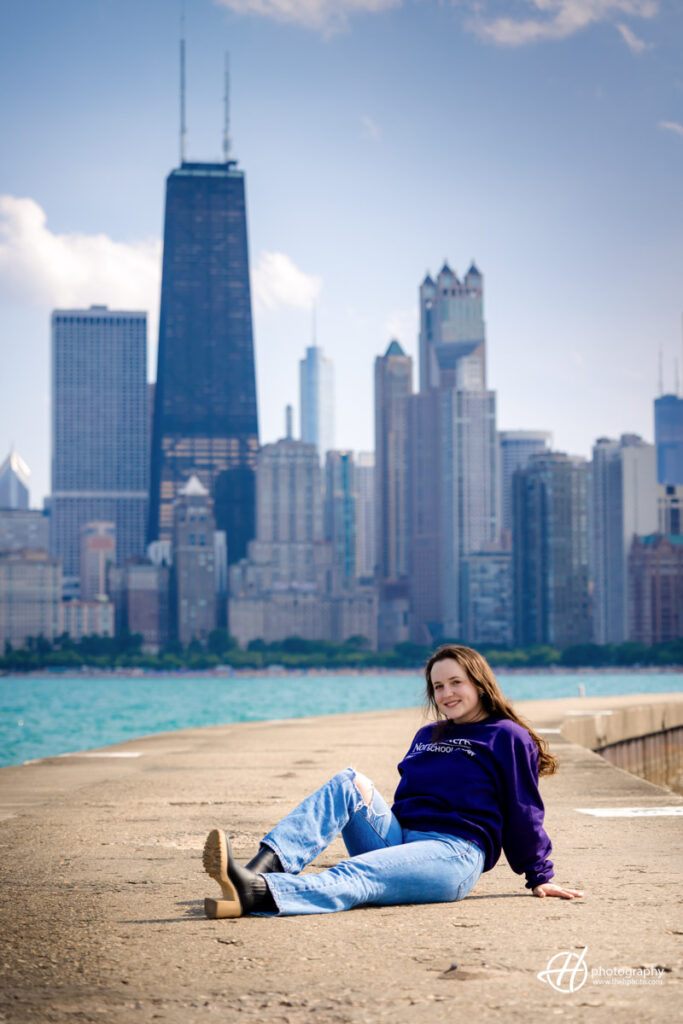 Amelia posing in her Northwestern University School of Law Sweater 