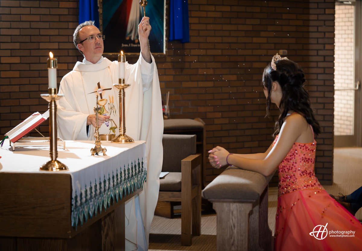 Sylvia being blessed at St. Catherine of Siena Church