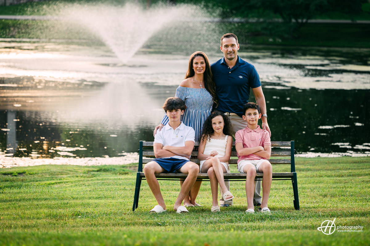 The Bruckner family posing by the water fountain at The Glen in South Barrington 