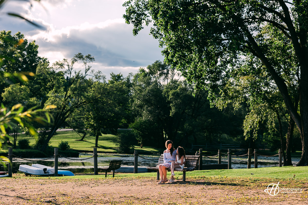 Rebecca and her daughter on the bench at the beach in The Glen 