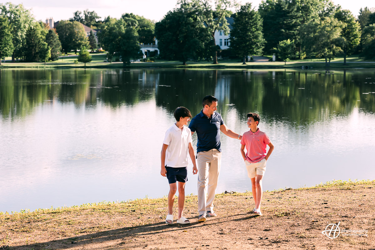 Joe and his sons walking on the beach at The Glen 