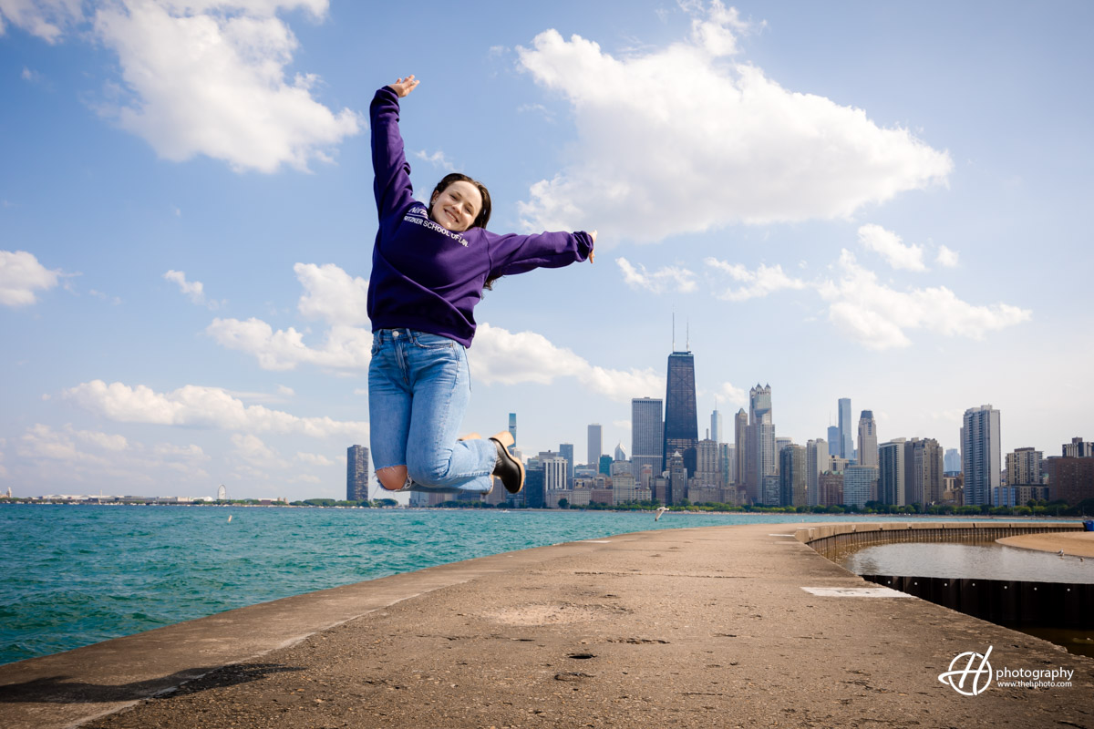 Jumping image with Chicago skyline in background. 