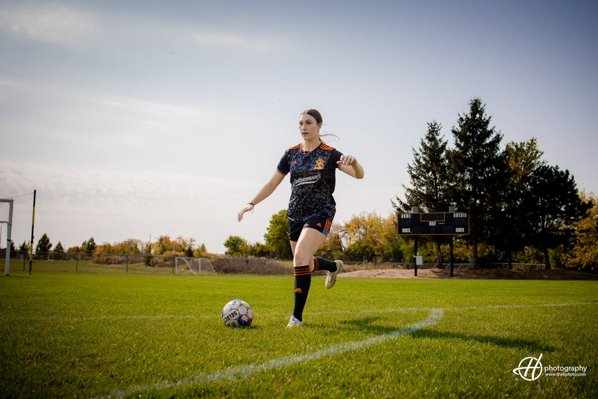 candid shot attacking at soccer 