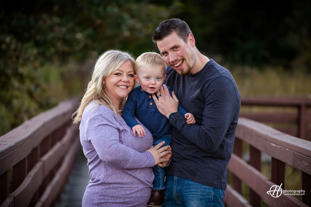 family portrait on the bridge at Veteran Acres in Crystal Lake 