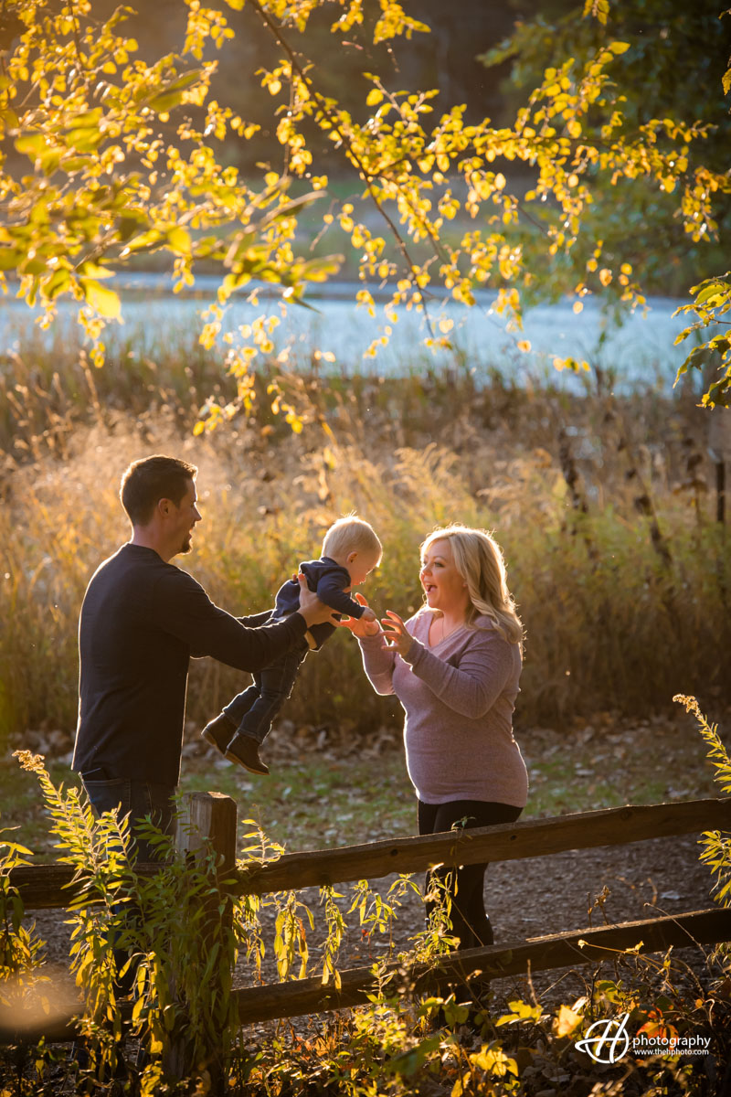 candid shot of family play in Veteran Acres Crystal Lake 