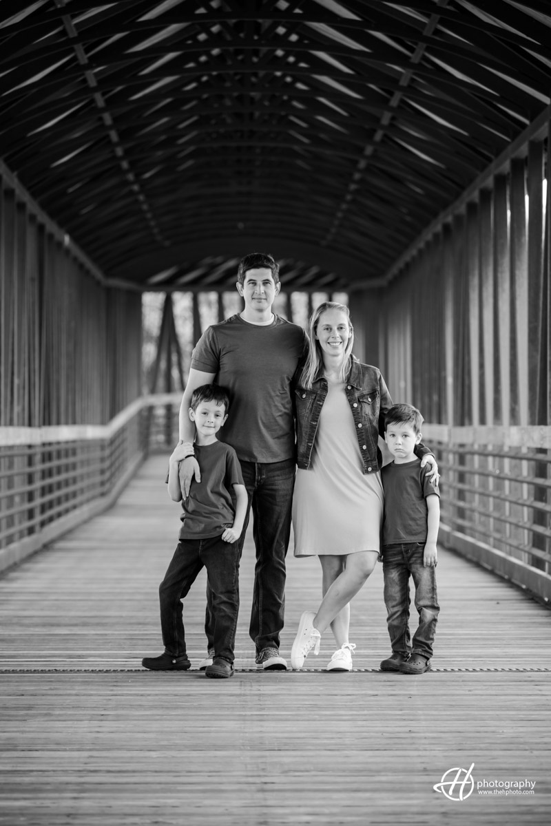 family portrait on the wooden bridge in St. Charles 