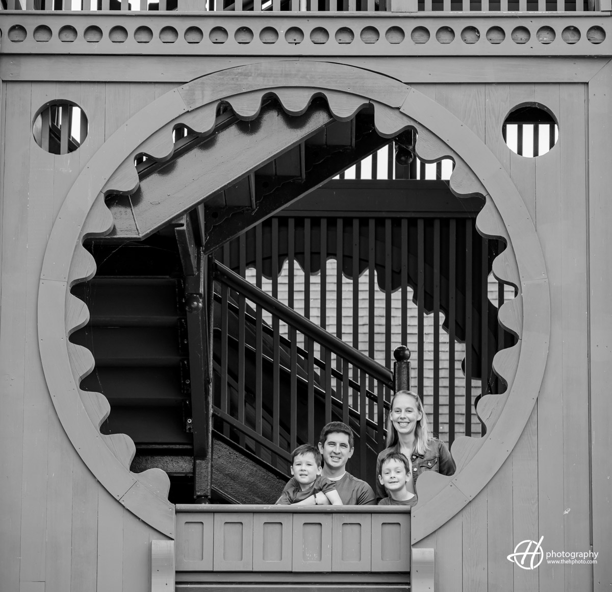 family photo in the wooden tower in Pottawatomie Park