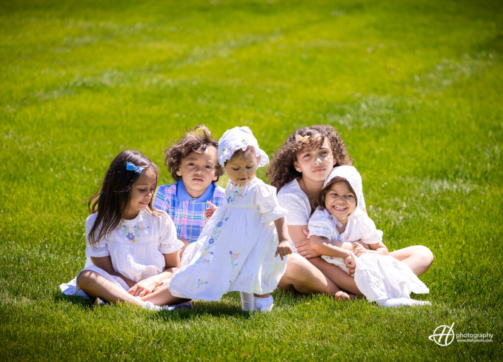 the kids posing in the lawn