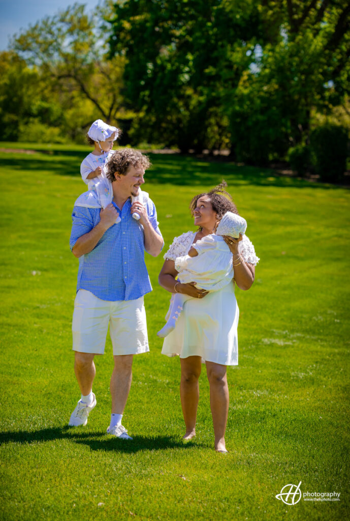 candid shot with Ashley and David by their house at THE Glen