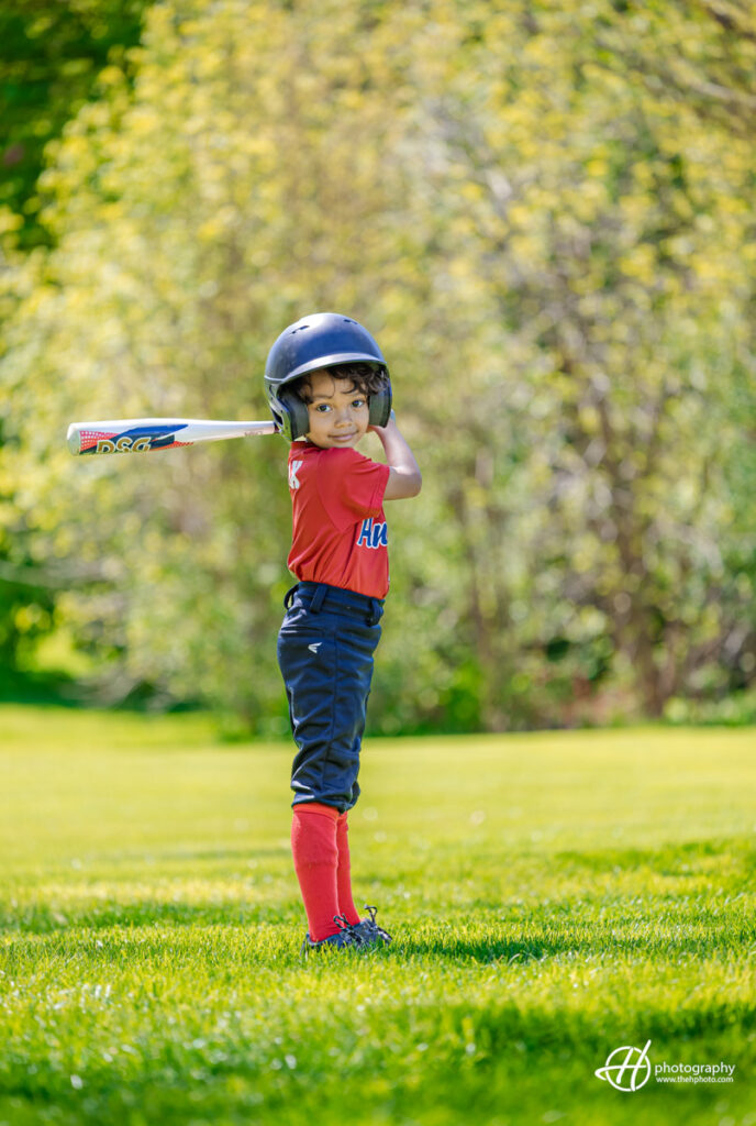 Max posing in his Baseball uniform