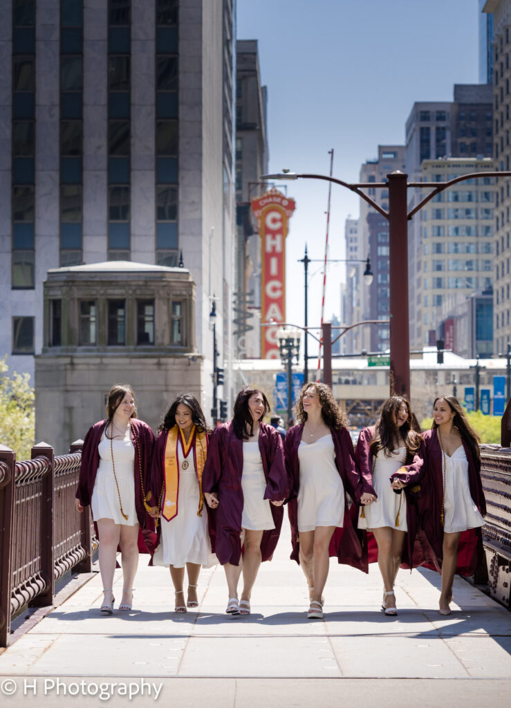 Senior Photos with Chicago Theater sign in bac
